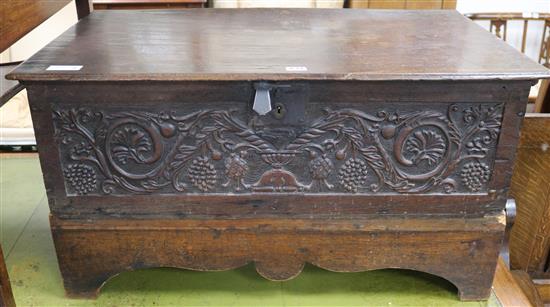 A carved coffer W.83cm